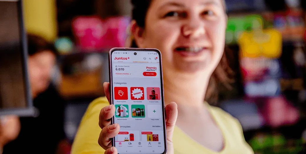 Tela do aplicativo Juntos+ com categorias, promoções e programa Premia