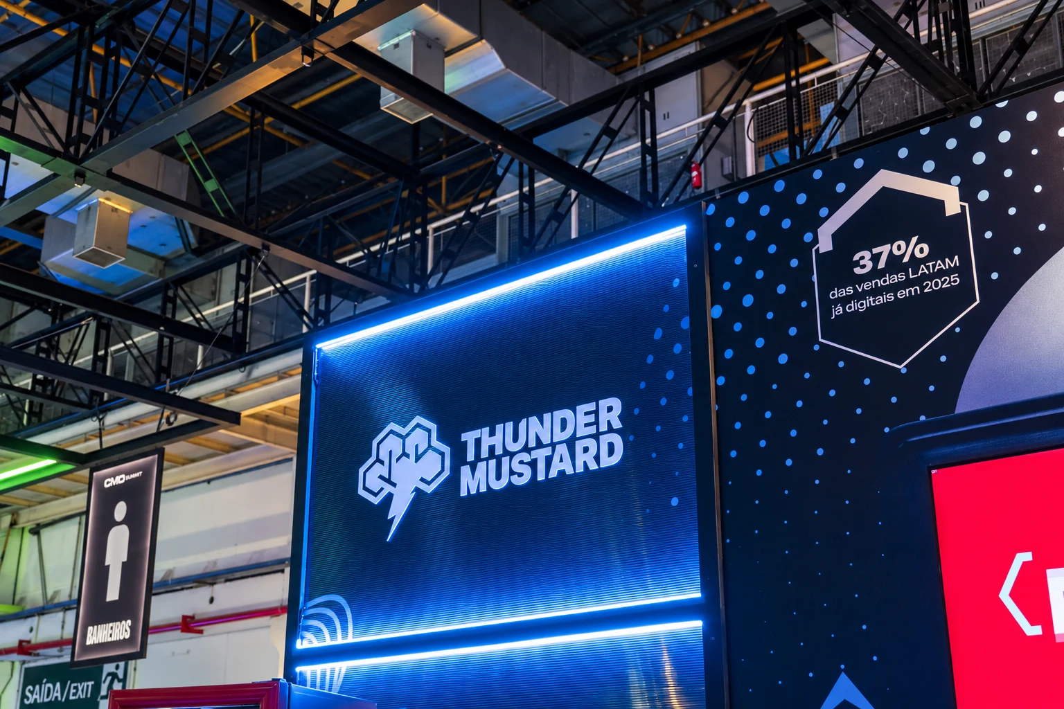 Illuminated Thunder Mustard sign at its booth.